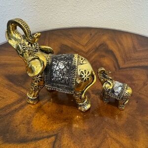 2 Decorative Elephant Figurines made of polyresin and  finished with decorative